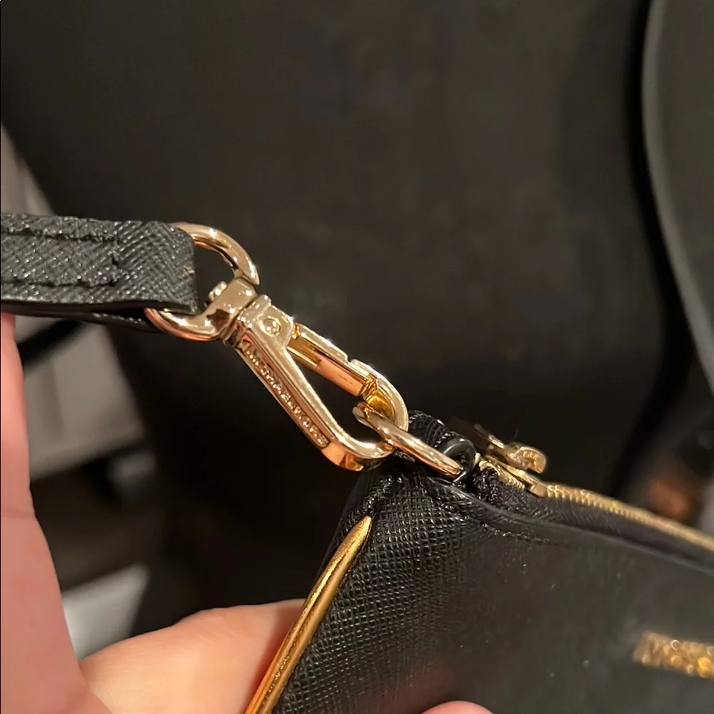Michael Kors Black Clutch with Gold Hardware